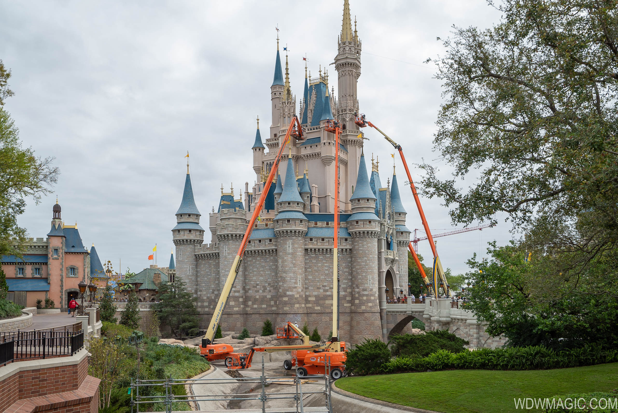 Photos High Reach Cranes Up At Cinderella Castle As Painting