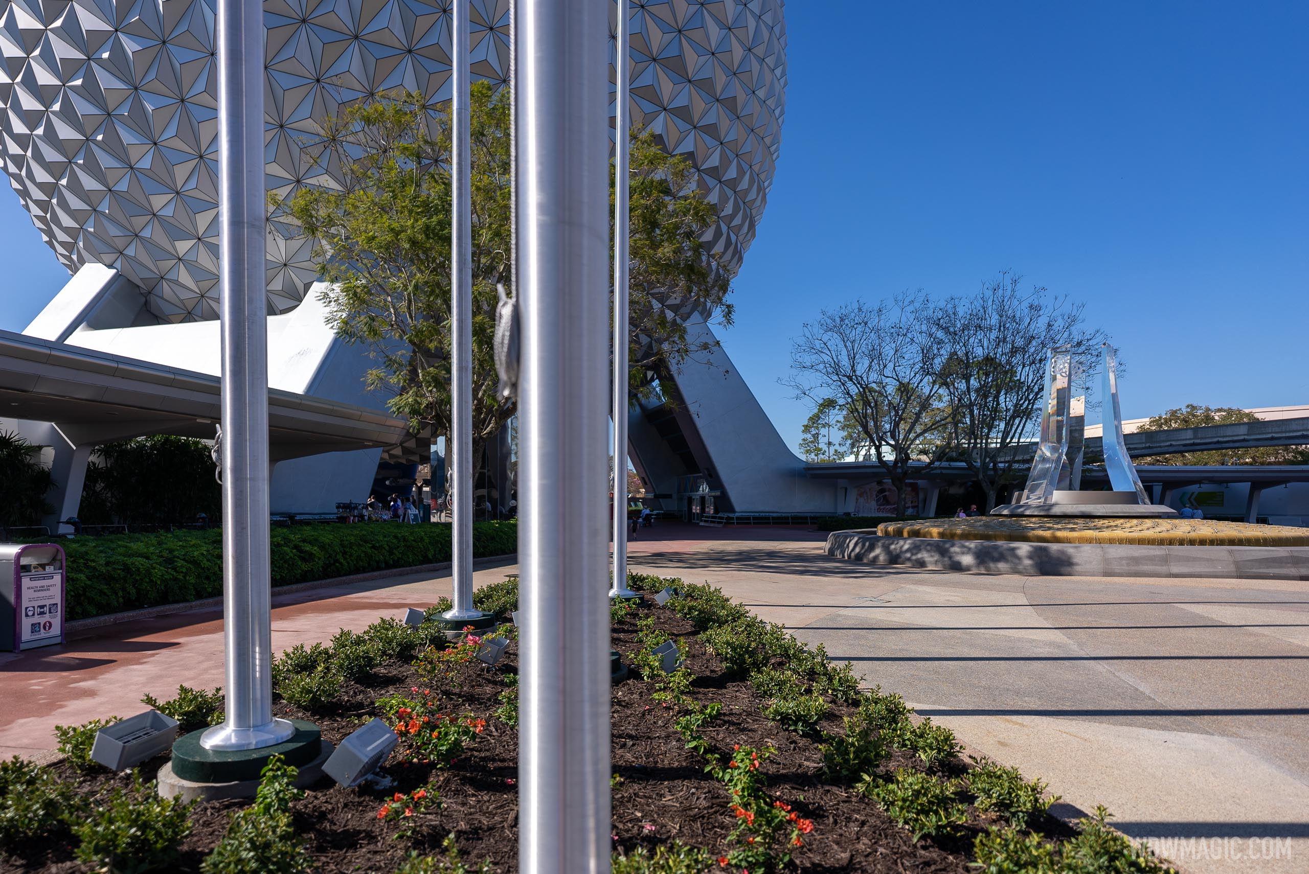 PHOTOS - First 6 flag poles installed on the east side of the new EPCOT ...