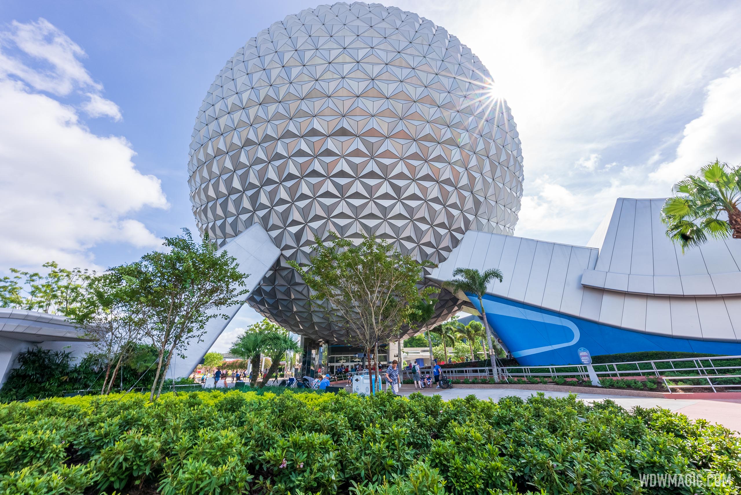 New landscaping beneath Spaceship Earth extends the green space of the new  EPCOT main entrance