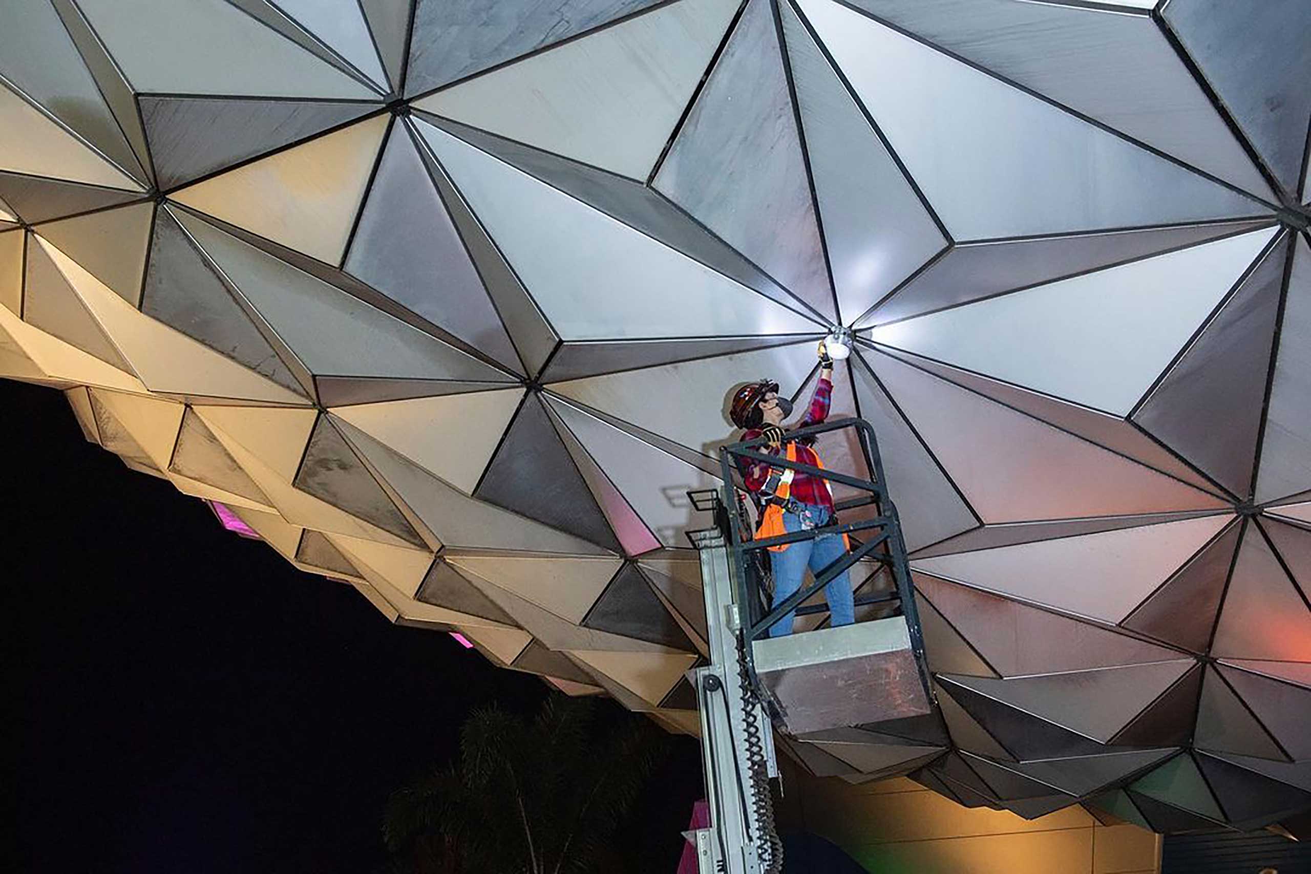 First light fixture in place on EPCOT'S Spaceship Earth for 'Beacon of  Magic' lighting effects
