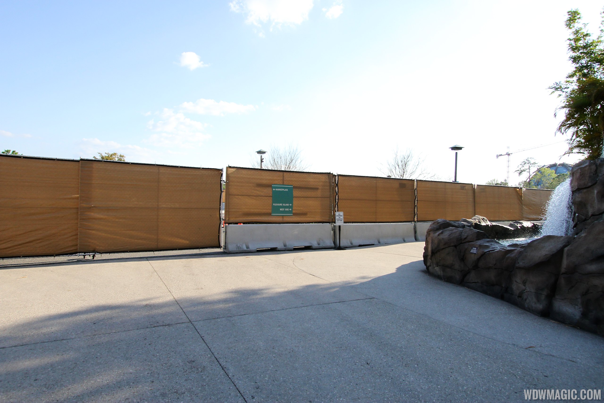 PHOTOS - Construction walls up around the now closed Pollo Campero and 