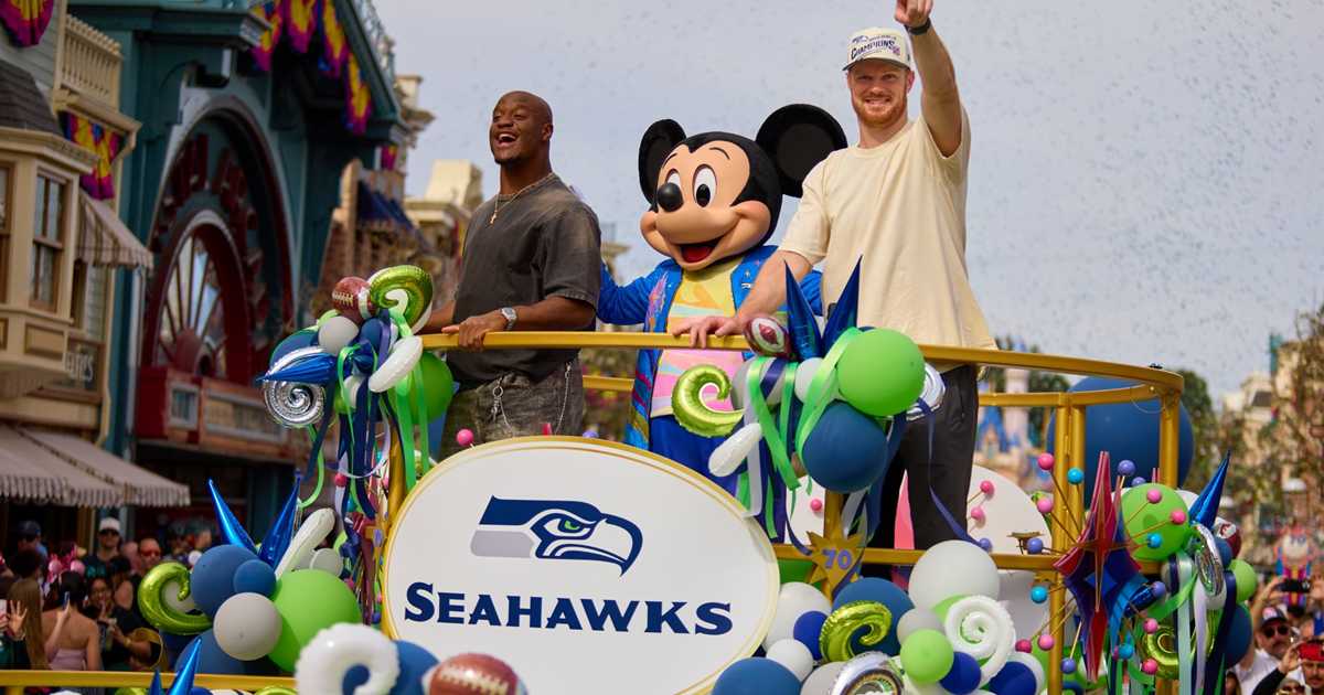 Sam Darnold and Kenneth Walker III's Super Bowl Celebration at Disneyland - Photo 3 of 4